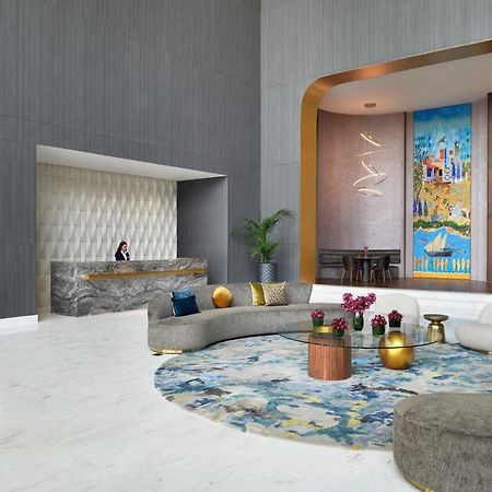Movenpick Jumeirah Village Triangle Dubai Esterno foto The lobby of the hotel