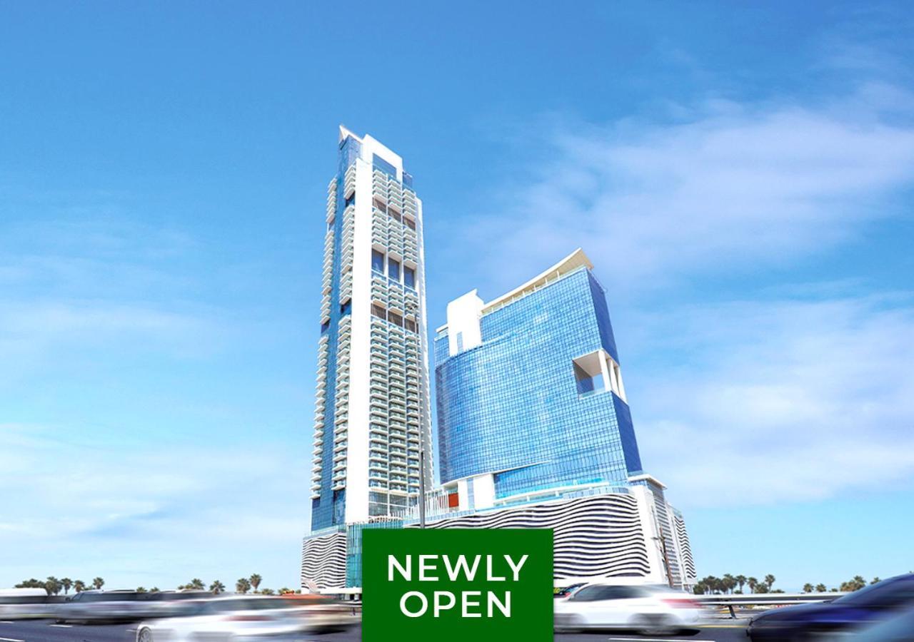 Movenpick Jumeirah Village Triangle Dubai Esterno foto The 101 Tower