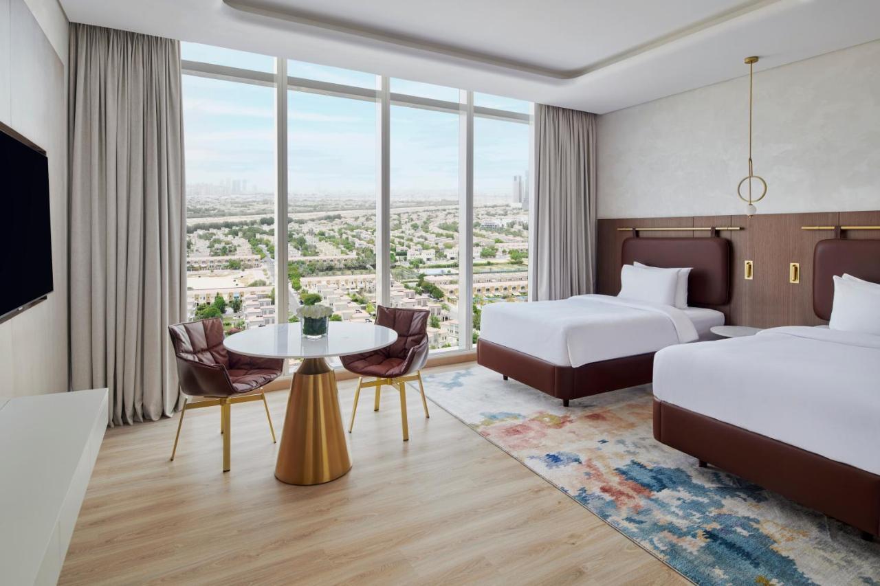 Movenpick Jumeirah Village Triangle Dubai Esterno foto Deluxe room
