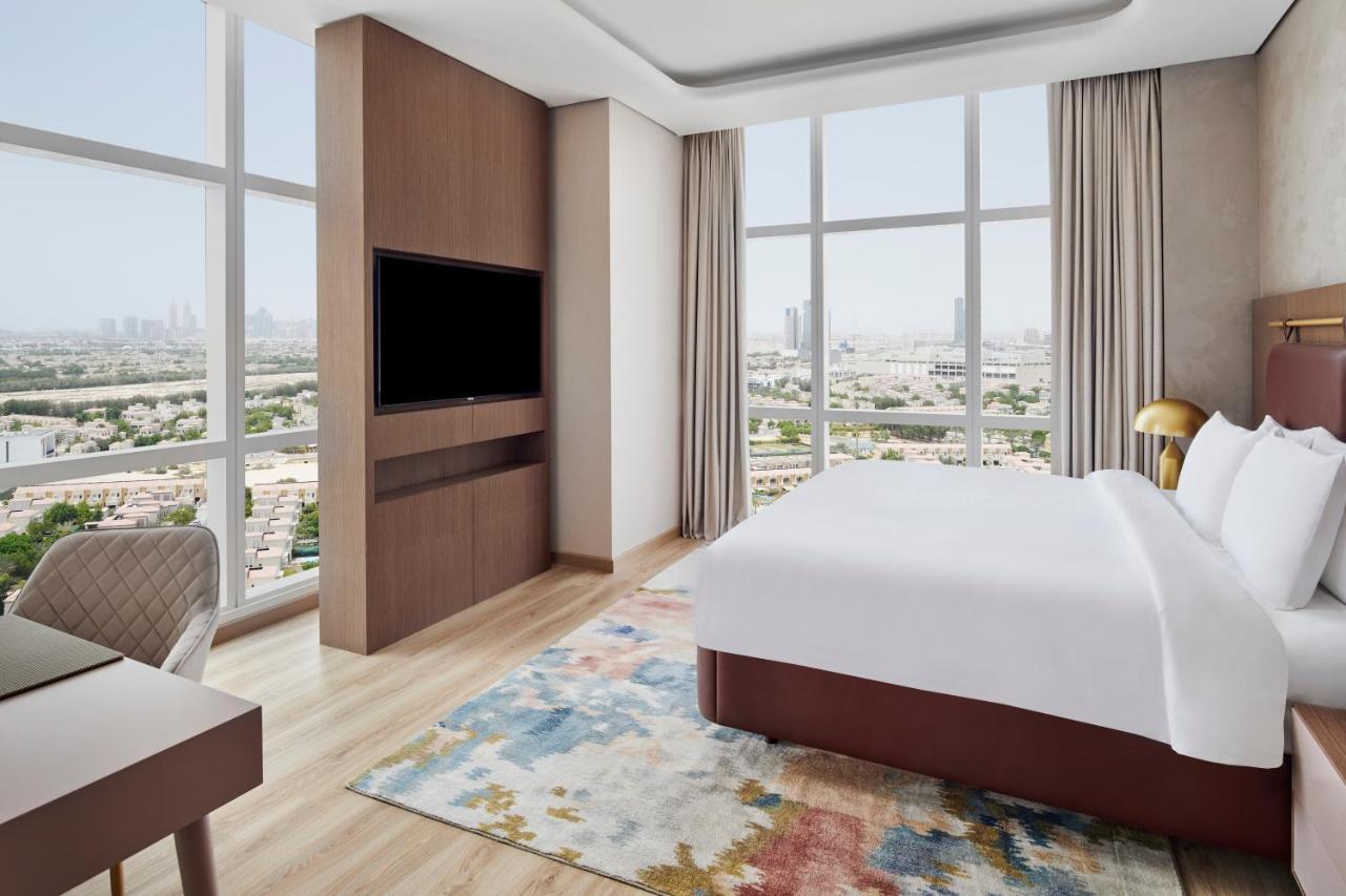 Movenpick Jumeirah Village Triangle Dubai Esterno foto
